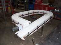 Conveyor with side rails that are made with King Hy-Pact®